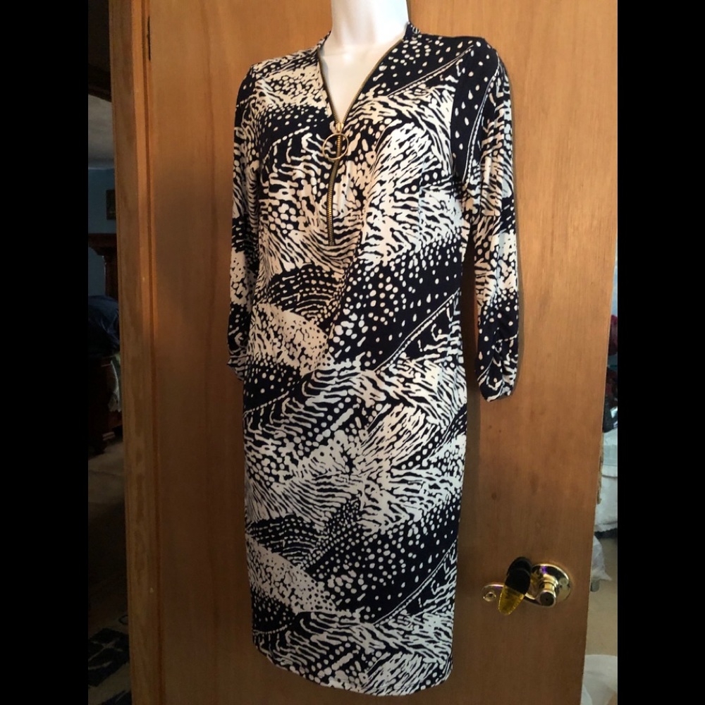 Black and white zip up dress with long sleeves